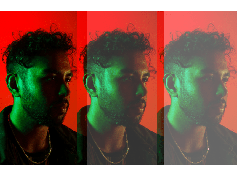The artist Luyah is standing slightly side on with a background of red. Green light shines on his face. He is wearing an dark top and a gold chain. The image is repeated three times.
